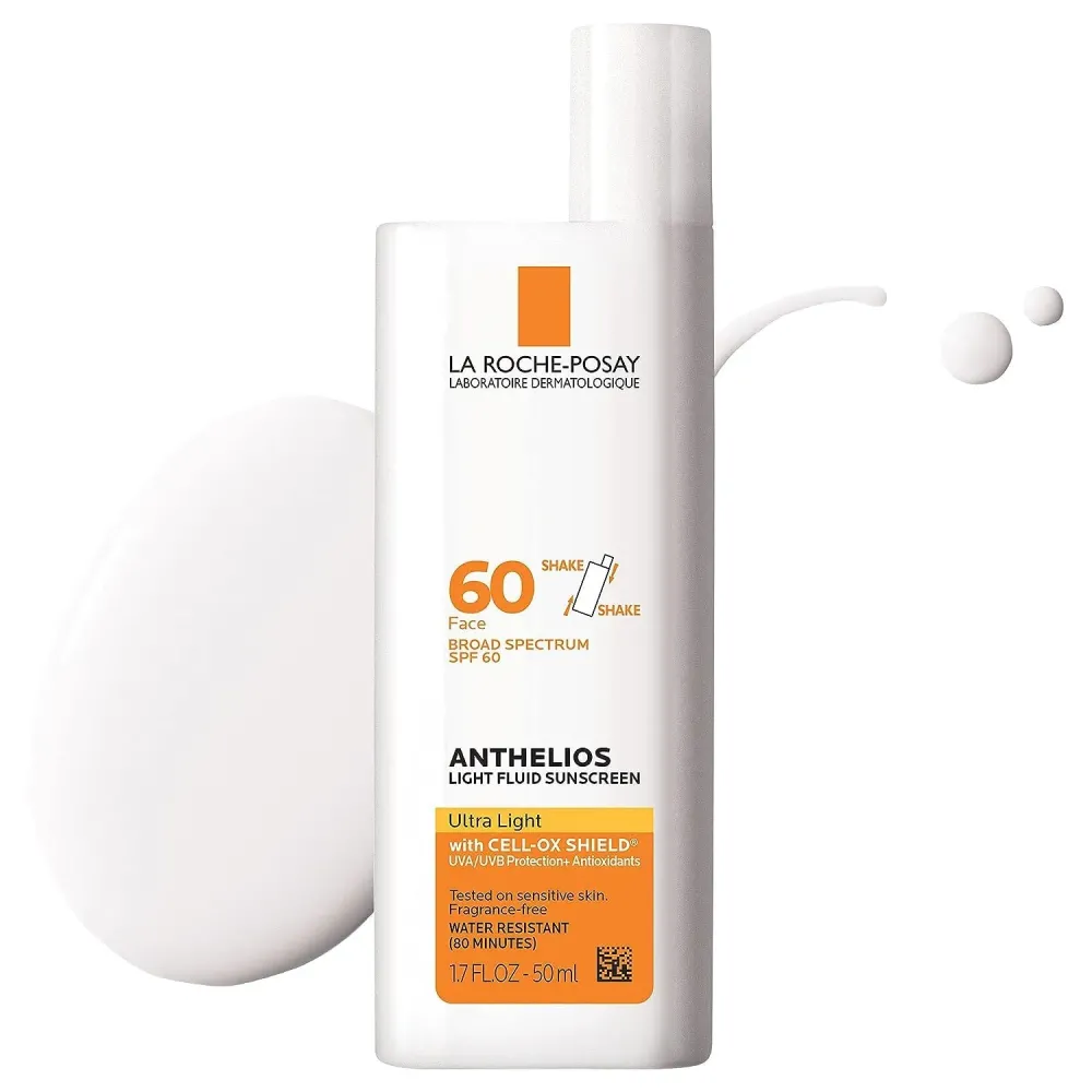 La Roche-Posay Anthelios Light Fluid Facial Sunscreen SPF 60, Lightweight Sunscreen For Face, Fluid Texture, Broad Spectrum SPF + Antioxidants, Oil Free & Oxybenzone Free, Travel Size 1.7 Fl. Oz. La Roche-Posay Anthelios Light Fluid Facial Sunscreen SPF 60, Lightweight Sunscreen For Face, Fluid Texture, Broad Spectrum SPF + Antioxidants, Oil Free & Oxybenzone Free, Travel Size 1.7 Fl. Oz.
