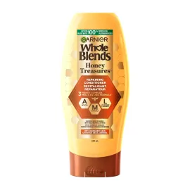 Garnier Whole Blends Repairing Conditioner Honey Treasures, Damaged Hair, 22 fl; oz. Garnier Whole Blends Repairing Conditioner Honey Treasures, Damaged Hair, 22 fl; oz.
