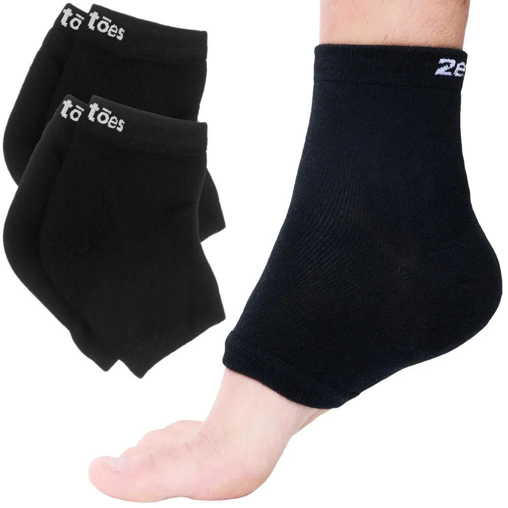 ZenToes Moisturizing Socks for Cracked Heel Treatment - Vitamin E, Olive Oil and Jojoba Oil Infused Heel Socks to Soften and Hydrate (Cotton Black, Regular) ZenToes Moisturizing Socks for Cracked Heel Treatment - Vitamin E, Olive Oil and Jojoba Oil Infused Heel Socks to Soften and Hydrate (Cotton Black, Regular)