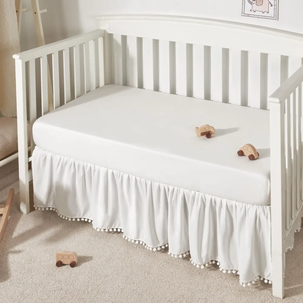 TILLYOU Ruffled Crib Skirt with Pompoms, Microfiber Nursery Crib Toddler Bedding Skirts for Baby Boys Girls, 14\'\' Drop, White TILLYOU Ruffled Crib Skirt with Pompoms, Microfiber Nursery Crib Toddler Bedding Skirts for Baby Boys Girls, 14\'\' Drop, White