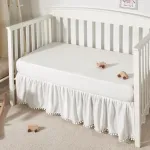 TILLYOU Ruffled Crib Skirt with Pompoms, Microfiber Nursery Crib Toddler Bedding Skirts for Baby Boys Girls, 14\'\' Drop, White