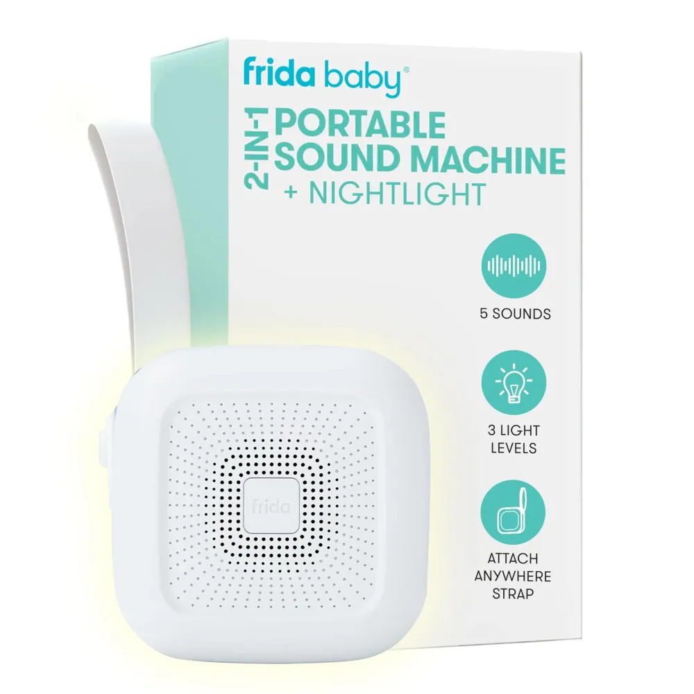 Frida Baby 2-in-1 Portable Sound Machine for Baby + Nightlight | White Noise Sound Machine for Baby with 5 Soothing Sounds & 3 Nightlight Modes | Travel Sound Machine Attaches to Strollers, Car Seats Frida Baby 2-in-1 Portable Sound Machine for Baby + Nightlight | White Noise Sound Machine for Baby with 5 Soothing Sounds & 3 Nightlight Modes | Travel Sound Machine Attaches to Strollers, Car Seats
