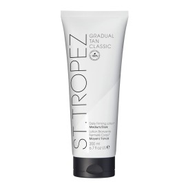 St.Tropez Gradual Tan Firming Lotion, Medium/Dark Shade, Sun Kissed Glow Self Tan Moisturizer, 5 Skincare Benefits, Vegan, Natural & Cruelty Free, 6.7 Fl Oz