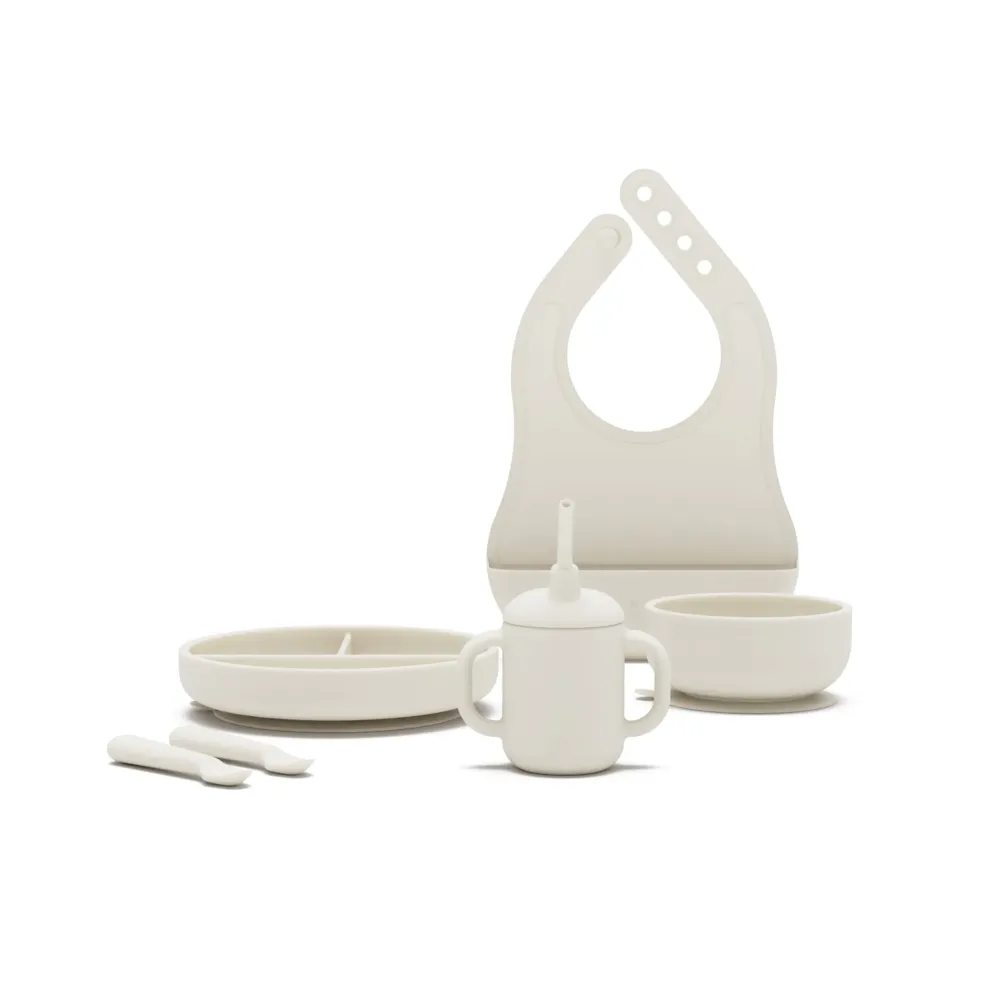 Lalo First Bites Silicone Baby Feeding Set - Baby Led Weaning Supplies - Non-Toxic Silicone - Includes 1 Bib, 2 Spoons, Training Cup, Suction Plate and Bowl - 6 Pieces - Oatmeal Lalo First Bites Silicone Baby Feeding Set - Baby Led Weaning Supplies - Non-Toxic Silicone - Includes 1 Bib, 2 Spoons, Training Cup, Suction Plate and Bowl - 6 Pieces - Oatmeal