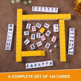 QYMZKA Japanese Riichi Mahjong Set, 144 White and Yellow Tiles - with Black Box, East Wind Tile, Set of Scoring Sticks, and Dices. QYMZKA Japanese Riichi Mahjong Set, 144 White and Yellow Tiles - with Black Box, East Wind Tile, Set of Scoring Sticks, and Dices.
