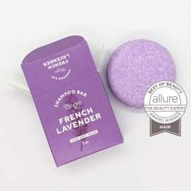 Natural Lavender Solid Shampoo Bar by Tangie. Lasts 50+ washes. Made in Florida, USA. Paper packaging is recyclable and compostable.
